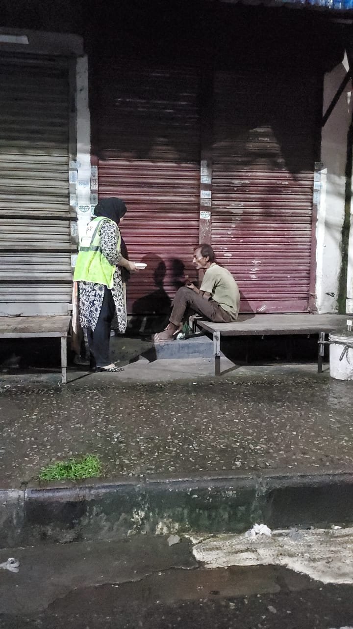 Volunteers distributing relief items